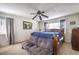 Primary bedroom with a king bed and ceiling fan at 4705 Rockvale Dr, Las Vegas, NV 89103