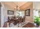 Spacious dining area featuring hardwood floors and large windows at 4705 Rockvale Dr, Las Vegas, NV 89103