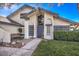 House exterior featuring a blue door and a stone pathway at 4705 Rockvale Dr, Las Vegas, NV 89103