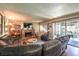 Living room with a sectional sofa, fireplace, and hardwood floors at 4705 Rockvale Dr, Las Vegas, NV 89103