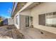 Small patio area with sliding glass door access at 4705 Rockvale Dr, Las Vegas, NV 89103