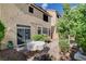 Relaxing backyard patio with table, chairs, and lush landscaping at 5957 Pillar Rock Ave, Las Vegas, NV 89139