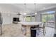 Kitchen with island and view into living room at 5957 Pillar Rock Ave, Las Vegas, NV 89139