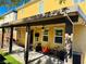 Backyard patio features a ceiling fan, outdoor seating, and a view of the house at 647 Wounded Star Ave, Las Vegas, NV 89178