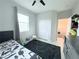 Upstairs bedroom featuring a closet, window with natural light, and neutral colors at 647 Wounded Star Ave, Las Vegas, NV 89178