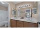 Bathroom with double vanity and view of bedroom at 734 Holland Heights Ave, Las Vegas, NV 89123