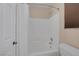 Clean bathroom with shower/tub combo and window at 734 Holland Heights Ave, Las Vegas, NV 89123