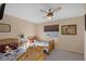 Bedroom with twin beds, ceiling fan and baseball decor at 734 Holland Heights Ave, Las Vegas, NV 89123