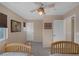 Bright bedroom with two twin beds, ceiling fan, and ample closet space at 734 Holland Heights Ave, Las Vegas, NV 89123