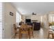 Bright dining area with wooden table and chairs next to the kitchen at 734 Holland Heights Ave, Las Vegas, NV 89123