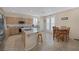 Kitchen with island, stainless steel appliances, and light wood cabinets at 734 Holland Heights Ave, Las Vegas, NV 89123