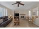 Spacious living room with fireplace and tiled floors at 734 Holland Heights Ave, Las Vegas, NV 89123