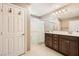 Bathroom with double vanity and large walk-in shower at 7915 Formitch Ct, Las Vegas, NV 89166