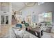 Living room with high ceilings, a fireplace, and a view of the kitchen at 10981 Laureldale Ct, Las Vegas, NV 89141