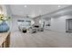 Bright, open living room featuring modern furnishings, a sleek fireplace, and abundant natural light at 11119 Cantoria Ct, Las Vegas, NV 89141