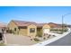 Attractive single-story home featuring a tile roof, desert landscaping, and a two-car garage at 1143 Tortoise Mountain Dr, Mesquite, NV 89034