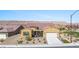 Beautiful desert-landscaped home with a private porch and stunning mountain views at 1143 Tortoise Mountain Dr, Mesquite, NV 89034