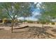 Patio area with fire pit and bocce ball at 248 N Milan St, Henderson, NV 89015