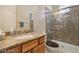 Clean bathroom, granite countertop, shower/tub combo at 248 N Milan St, Henderson, NV 89015