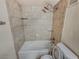 Clean bathroom with tiled walls, bathtub, and shower at 2867 Geary Pl # 3008, Las Vegas, NV 89109