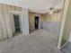 Dining area with wood-look wall and access to kitchen at 2867 Geary Pl # 3008, Las Vegas, NV 89109