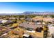 Aerial view of a house with a backyard and garden at 5024 Crown Cypress St, Las Vegas, NV 89149