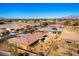 Aerial view of house's backyard, showing a large yard and neighboring properties at 5024 Crown Cypress St, Las Vegas, NV 89149