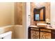 Charming powder room with decorative sink and tile accents at 5024 Crown Cypress St, Las Vegas, NV 89149