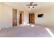 Large bedroom with private bathroom access and lots of natural light at 5024 Crown Cypress St, Las Vegas, NV 89149