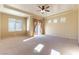 Spacious primary bedroom with walk-in closet and patio access at 5024 Crown Cypress St, Las Vegas, NV 89149