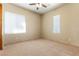 Bright bedroom with neutral walls and carpet at 5024 Crown Cypress St, Las Vegas, NV 89149