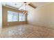 Dining room with high ceilings, a chandelier, and beige tile flooring at 5024 Crown Cypress St, Las Vegas, NV 89149