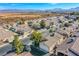 Aerial view of a residential neighborhood with mountain views at 5123 Mascaro Dr, Las Vegas, NV 89122