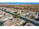 Aerial view of houses and a quiet residential street at 5123 Mascaro Dr, Las Vegas, NV 89122