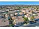 Aerial view of a residential neighborhood with a pool at 5123 Mascaro Dr, Las Vegas, NV 89122