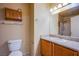 Clean bathroom with single sink vanity, shower/tub combo, and toilet at 5123 Mascaro Dr, Las Vegas, NV 89122