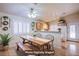 Dining area with a rustic wooden table and bench seating at 5123 Mascaro Dr, Las Vegas, NV 89122