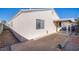 Home's exterior with covered patio and brick pavers at 5123 Mascaro Dr, Las Vegas, NV 89122