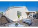 Backyard view showing patio furniture and landscaping at 5123 Mascaro Dr, Las Vegas, NV 89122