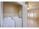 Laundry room with washer, dryer, and access to other rooms at 5123 Mascaro Dr, Las Vegas, NV 89122