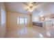 Spacious living room featuring tile floors and a built-in entertainment center at 5123 Mascaro Dr, Las Vegas, NV 89122