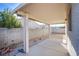 Covered patio with gravel and block wall at 5123 Mascaro Dr, Las Vegas, NV 89122