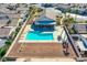 Community pool with a surrounding patio and lounge chairs at 5123 Mascaro Dr, Las Vegas, NV 89122