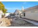 Spacious backyard with patio, fire pit, and storage shed at 5125 Coral Beach St, North Las Vegas, NV 89031