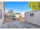 Backyard with patio, storage shed, and partially landscaped yard at 5125 Coral Beach St, North Las Vegas, NV 89031