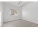 Well-lit bedroom with large window and neutral wall colors at 5125 Coral Beach St, North Las Vegas, NV 89031