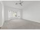 Spacious bedroom with ceiling fan and bay window at 5125 Coral Beach St, North Las Vegas, NV 89031