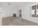 Bright living room featuring a fireplace and sliding glass doors at 5125 Coral Beach St, North Las Vegas, NV 89031