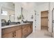 Modern bathroom with double vanity and walk-in shower at 540 Front Range Ln, North Las Vegas, NV 89084