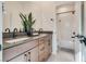 Modern bathroom with double vanity and bathtub at 540 Front Range Ln, North Las Vegas, NV 89084